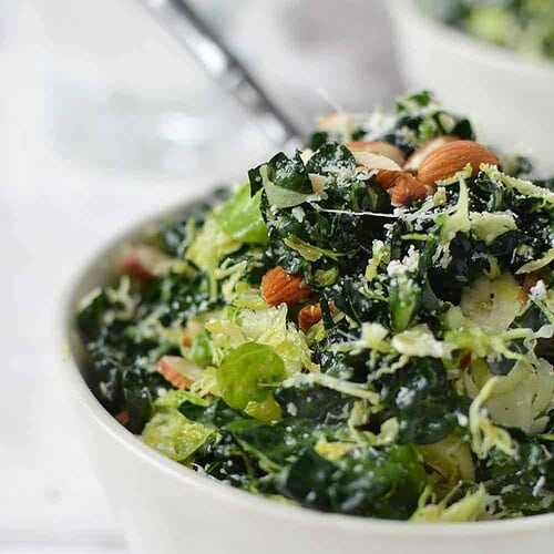Shredded Brussels Sprouts Salad With Toasted Almonds And Grated Parmesan. The Best Salad, Perfect For Thanksgiving And The Holidays! You Must Make This One. | Www.delishknowledge.com