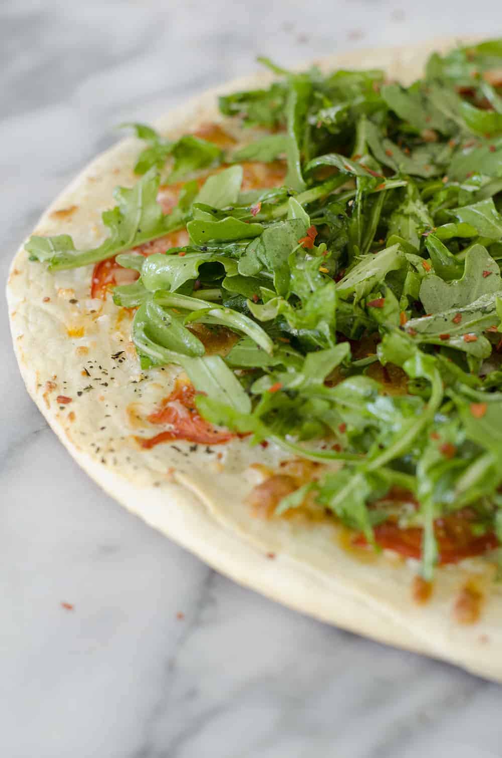 White Pizza With Arugula For Two! This Pizza Is Ready In Just 30 Minutes And Serves 2. White Pizza With Spicy Arugula Salad. | Www.delishknowledge.com