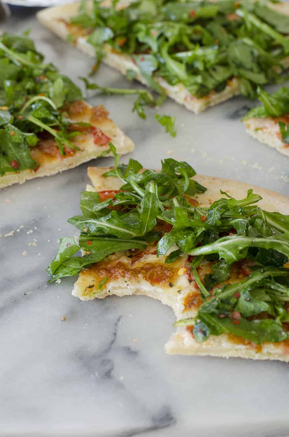 White Pizza With Arugula For Two! This Pizza Is Ready In Just 30 Minutes And Serves 2. White Pizza With Spicy Arugula Salad. | Www.delishknowledge.com