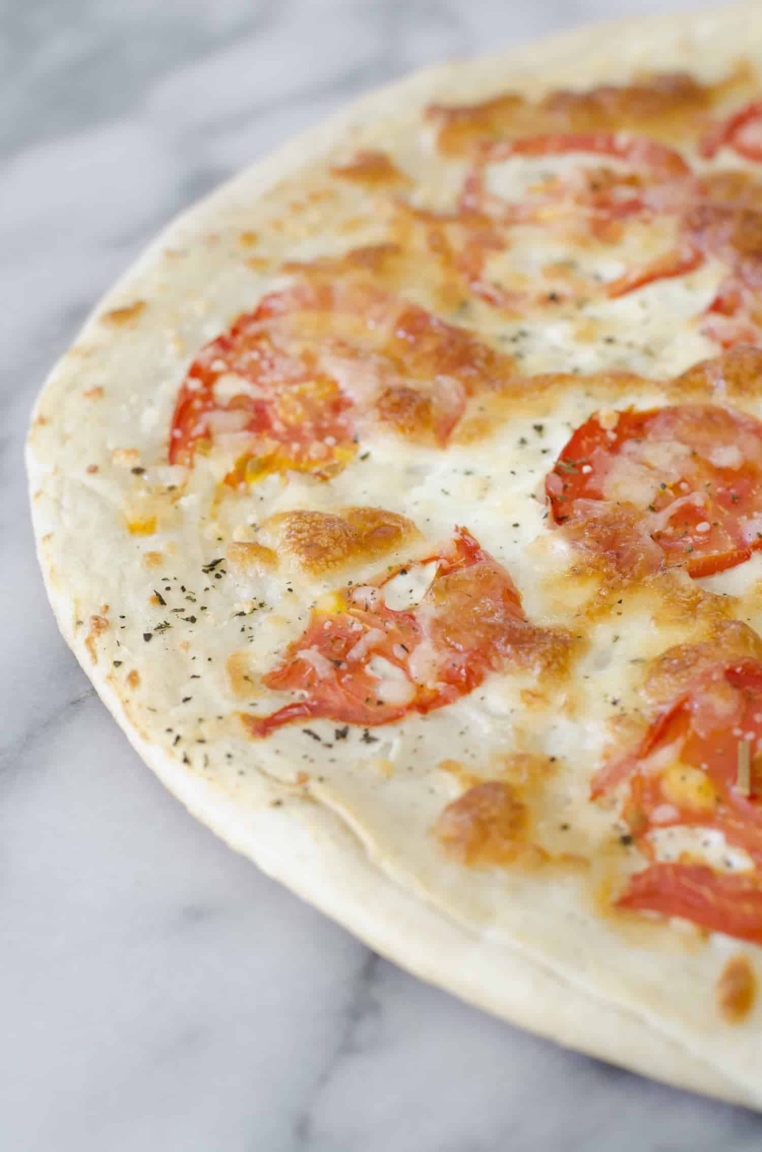 White Pizza With Arugula For Two! This Pizza Is Ready In Just 30 Minutes And Serves 2. White Pizza With Spicy Arugula Salad. | Www.delishknowledge.com