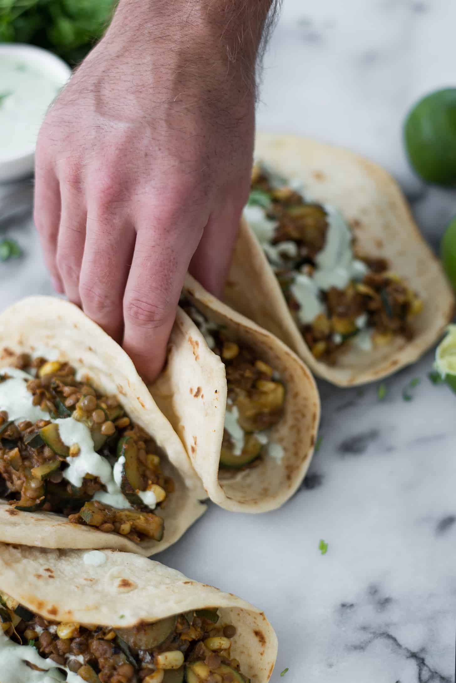 Zucchini And Lentil Tacos! A Perfect Vegan Dinner. Spicy Zucchini And Corn, Lentils With A Creamy Jalapeno-Lime Sauce. | Www.delishknowledge.com