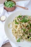 One Pot Vegetable Pasta! Throw everything in a pot and you are done! Loaded with vegetables like peas, spinach and mushrooms. | www.delishknowledge.com